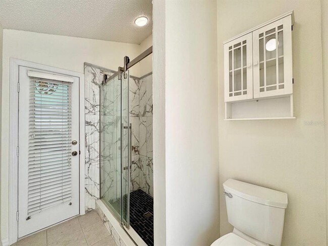 Building Photo - 10028 Oasis Palm Dr