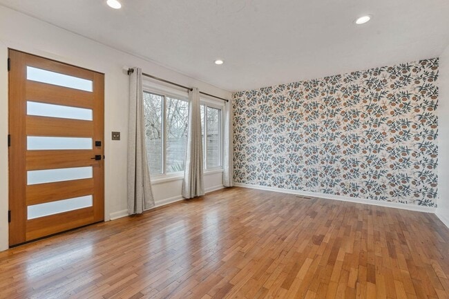 Building Photo - Beautiful, modern 4-bdrm/2-bath home in Concordia—Private, urban sanctuary w/ flex spaces