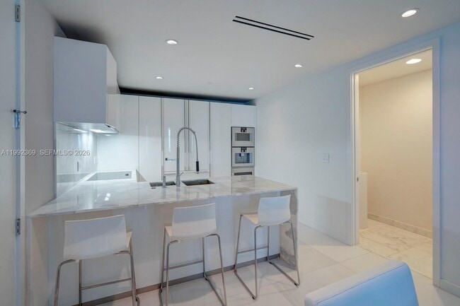 Building Photo - 10203 Collins Ave