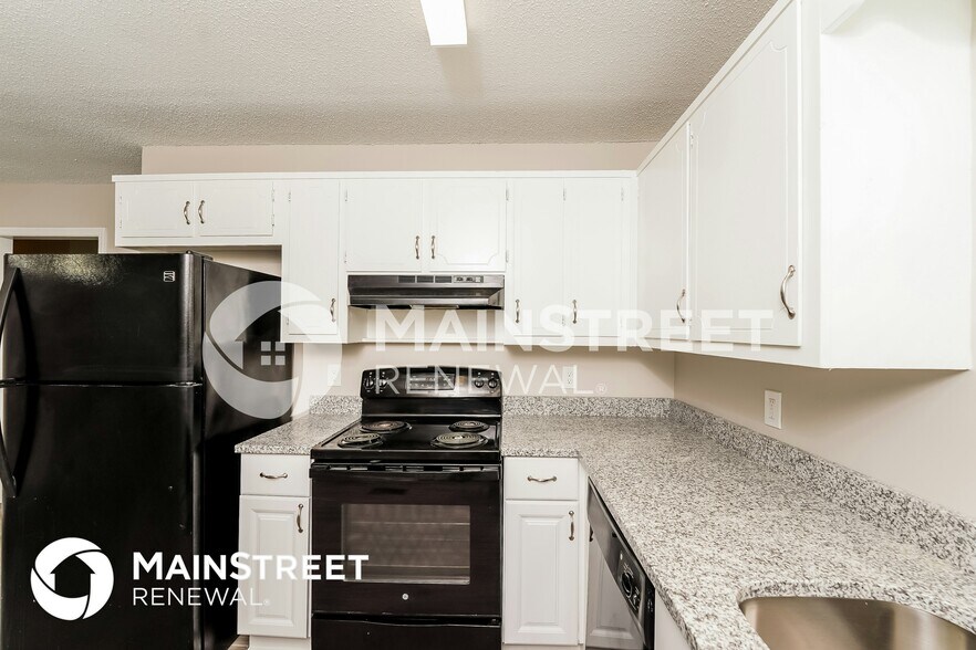 Building Photo - 6594 Davison Rd