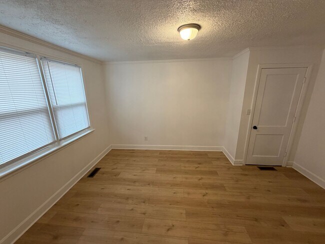 Building Photo - Updated 3 bedroom home with large front porch