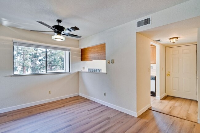 Building Photo - New Vinyl Plank Flooring, Fresh Interior Paint, 1 Car Garage + 1 Assigned Outdoor Parking Space -...