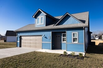 Building Photo - Elegant Home with Stone Fireplace, Kitchen Island and Designer Primary Suite