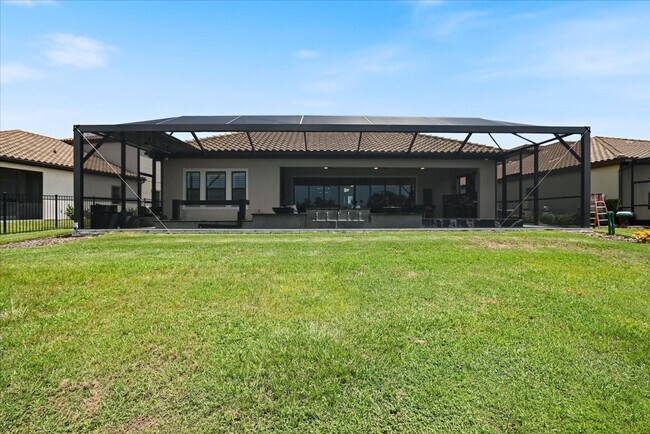 Building Photo - Luxury Home w/ Pool, Outdoor Kitchen, Car Lift, & Water View In Parrish!