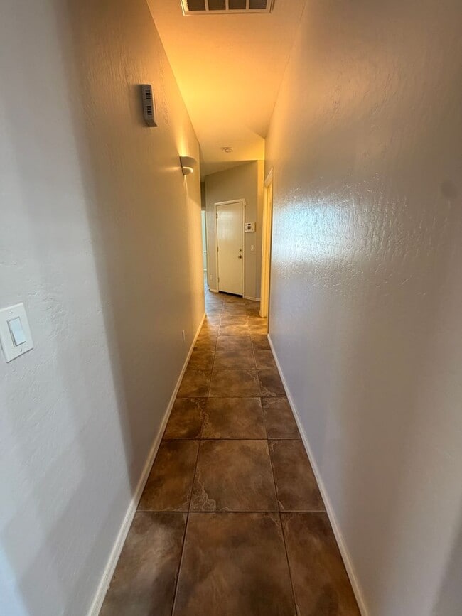 Building Photo - *NEW* Custom Paint/*NO* Carpet 3 BD/2 Bath Spacious Surprise Home!