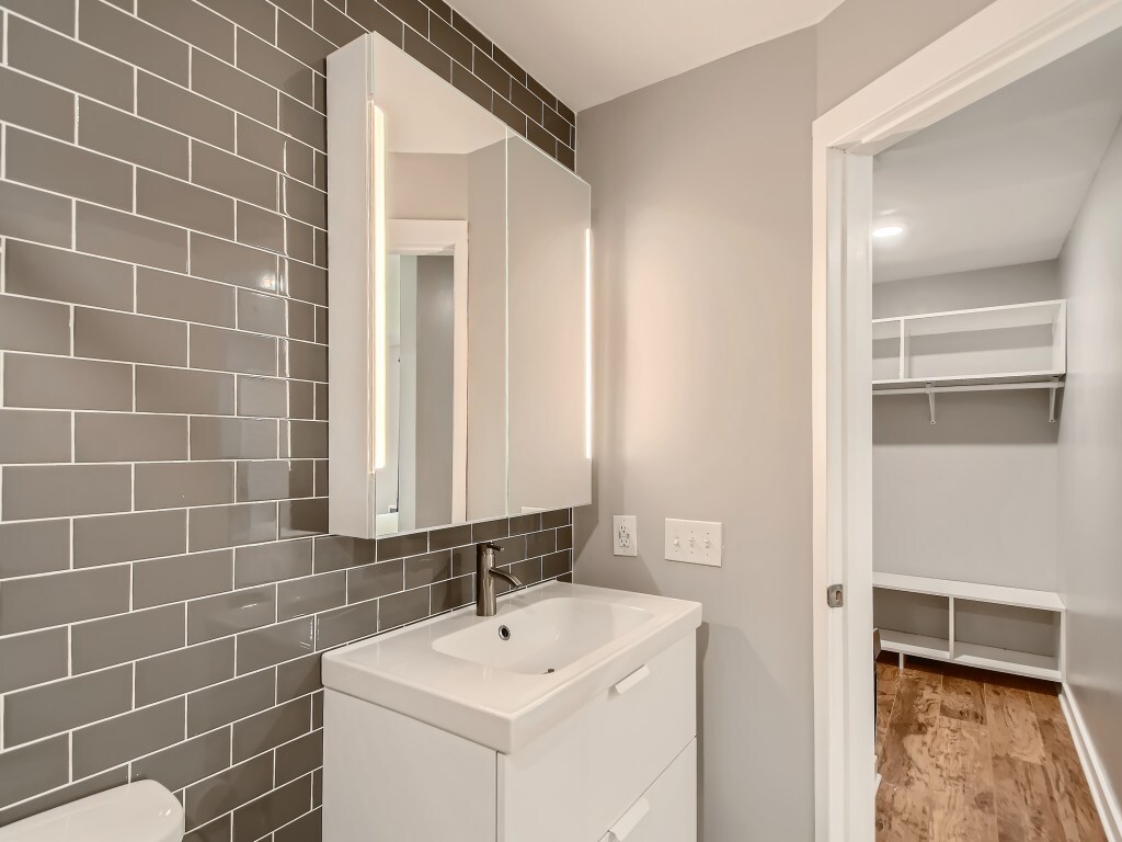 Light up vanity has plenty of storage - 2100 Ridge Dr