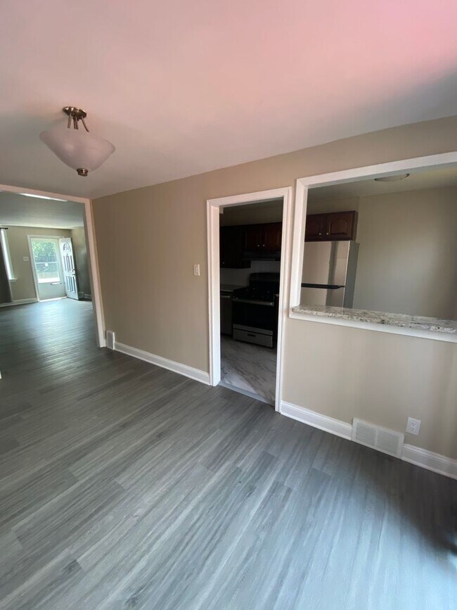 Building Photo - Completely New Row House with Deck Available Now