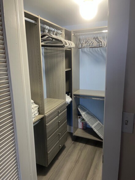 walkin closet organized - 3001 NW 48th Ave