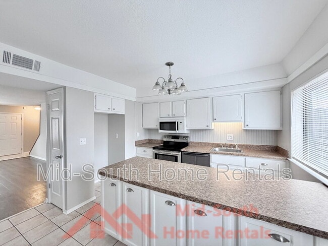 Building Photo - 1869 Poplar Woods Cir E