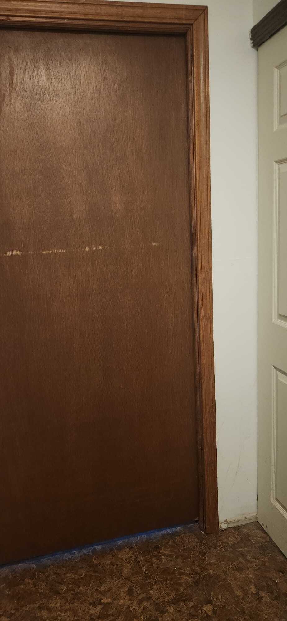 Door to livingroom in downstairs apartment closed - 2116 Thaler Ave