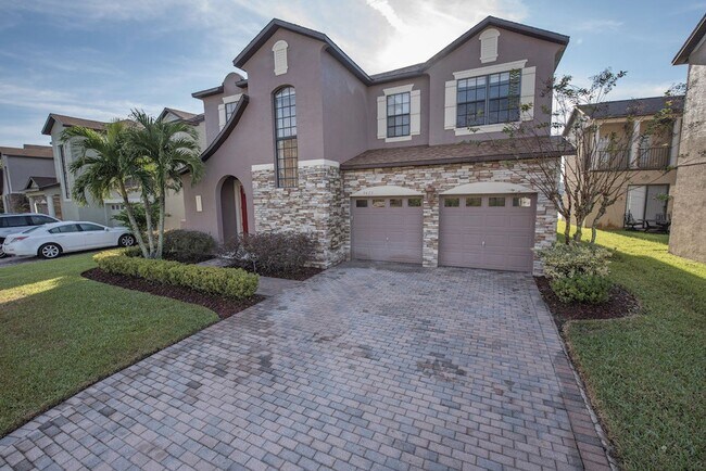 Building Photo - Large, Executive style 3/2.5 Lakefront/POOL Home in East Park of Lake Nona
