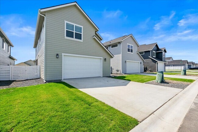 Building Photo - Brand New, Stylish 4-Bedroom Home with Vaulted Ceilings and Private Patio