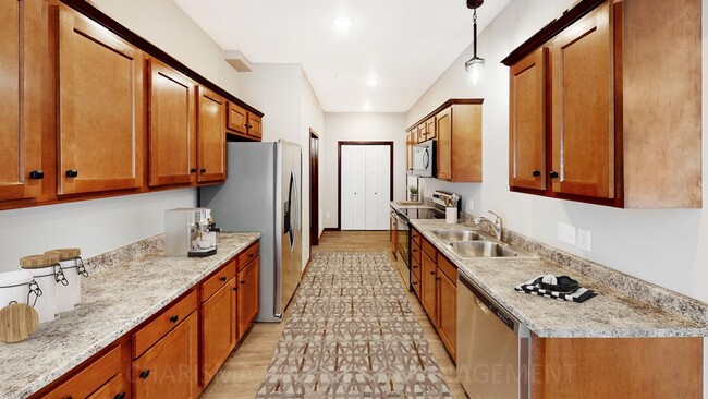 Building Photo - 3 BD, 2.5 BA TOWNHOME, DOUBLE ATTACHED GAR...