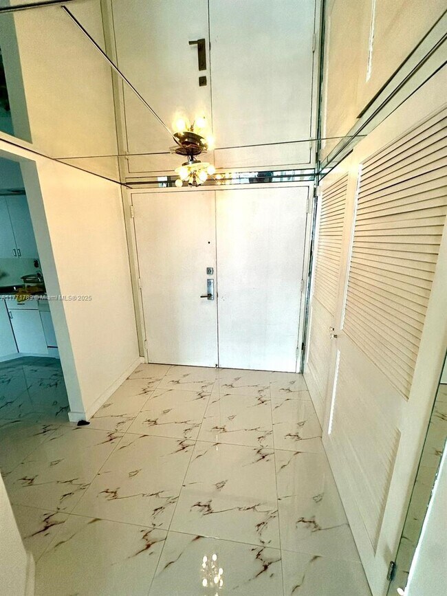Building Photo - 6423 Collins Ave
