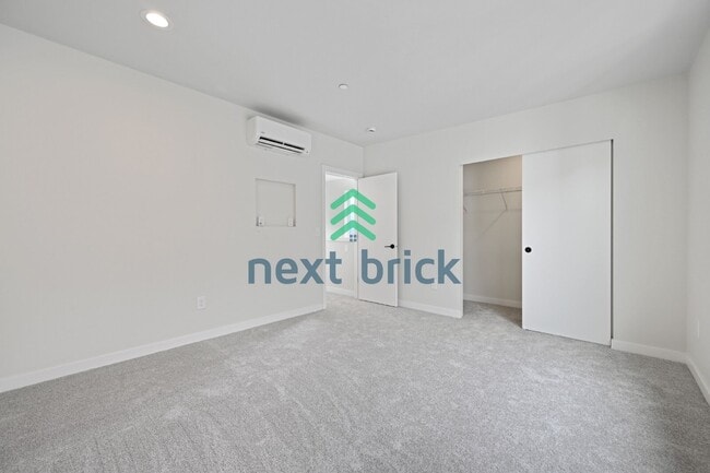 Building Photo - Brand-New 2026 Townhome | 3 Bed | 2.5 Bath | 1,560 Sq Ft | EV Garage | A/C Included