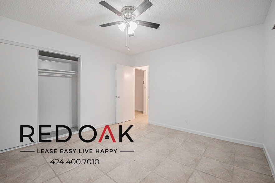 Building Photo - 15901 S Vermont Ave