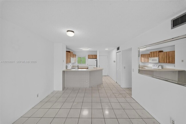 Building Photo - 8750 N Sherman Cir