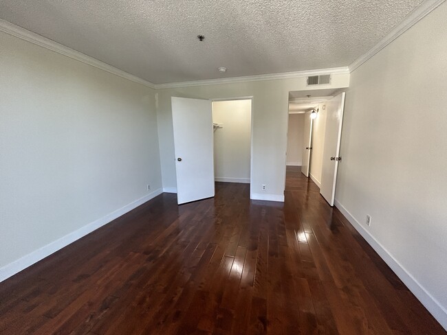 walk-in closet in 2nd bedroom - 10811 Ashton Ave