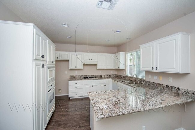 Building Photo - Open-Concept 4BD Home with Granite Counters & Attached Two-Car Garage