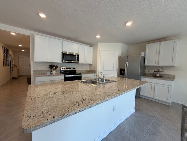 Building Photo - 4 Bed 2 Bath Home in Avalon Woods! FULLY FENCED YARD