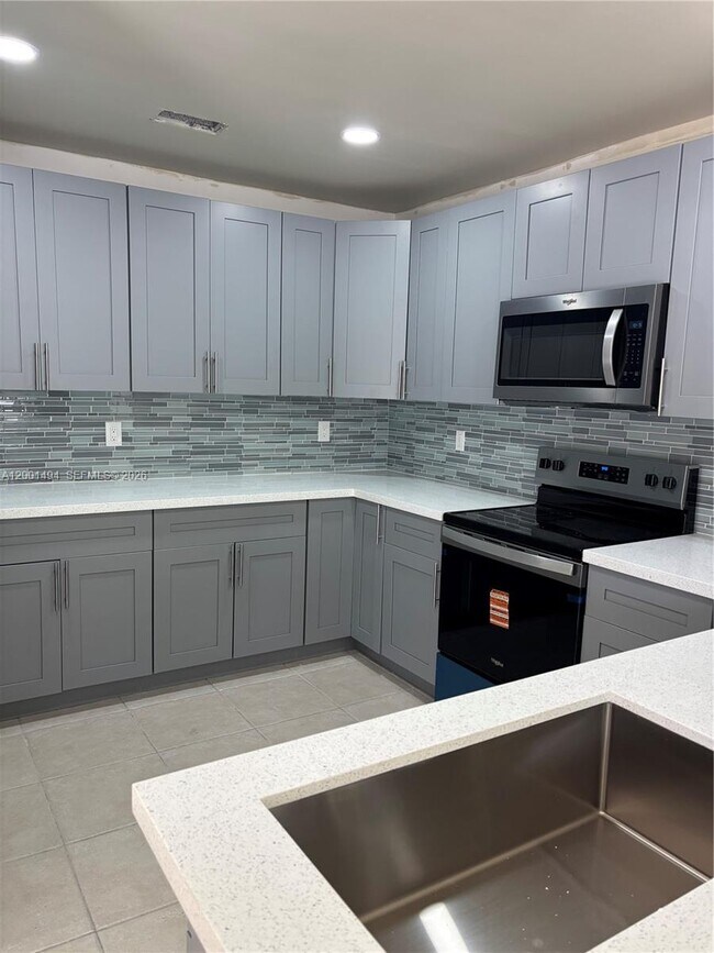 Building Photo - 5450 NW 94th Terrace