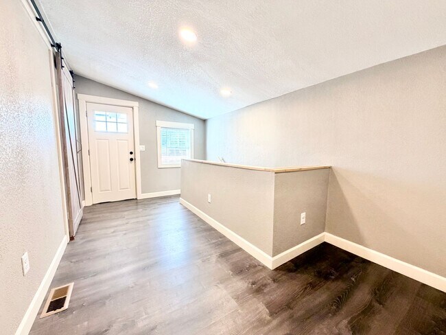 Building Photo - Lovingly Updated Home with Separate Garage, Outdoor Cat Enclosure, Finished Basement, Large Yard,...