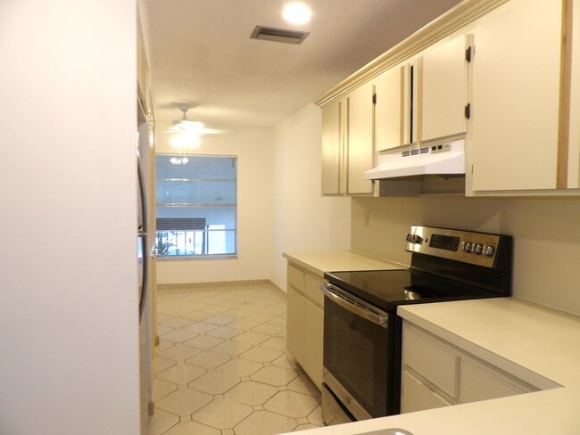 Building Photo - 13283 Pineapple Palm Ct