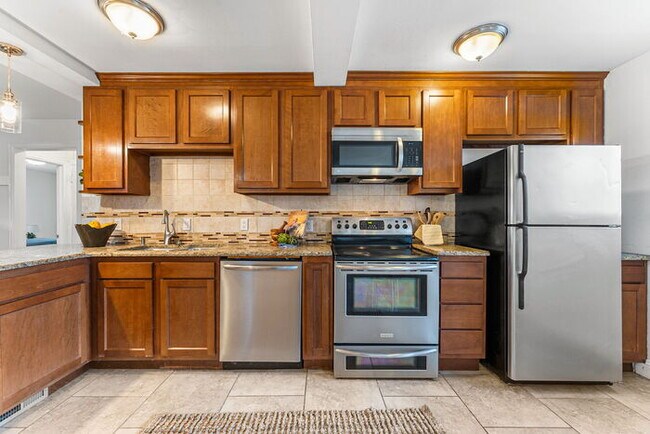 Building Photo - Beautiful Open Concept Brick Ranch blocks ...