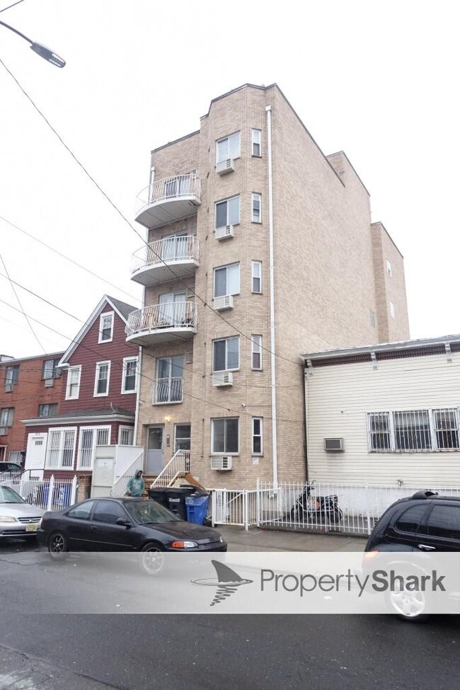 Primary Photo - 69-8 38th Ave
