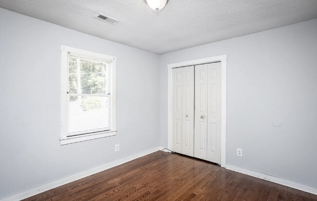 Building Photo - " 2-Bed Duplex on Large Lot- Off Street Parking"