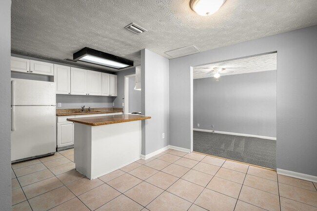Building Photo - Timuquana 3BR/2BA Solid Brick Home w/ Flex Space & Private Yard