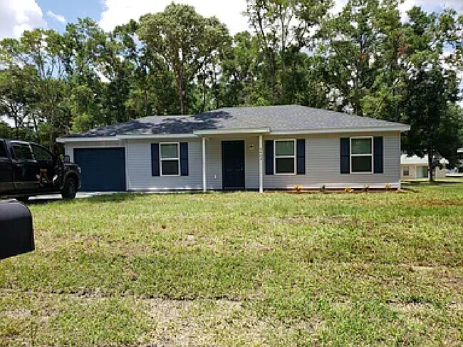 Building Photo - 5463 NW 54th Pl