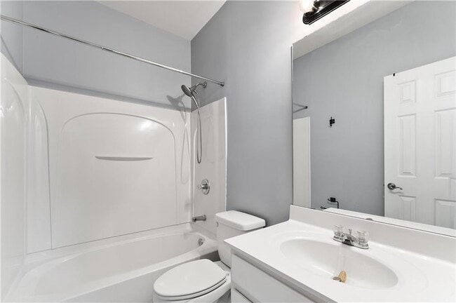 Building Photo - 4674 Creekside Villas Way