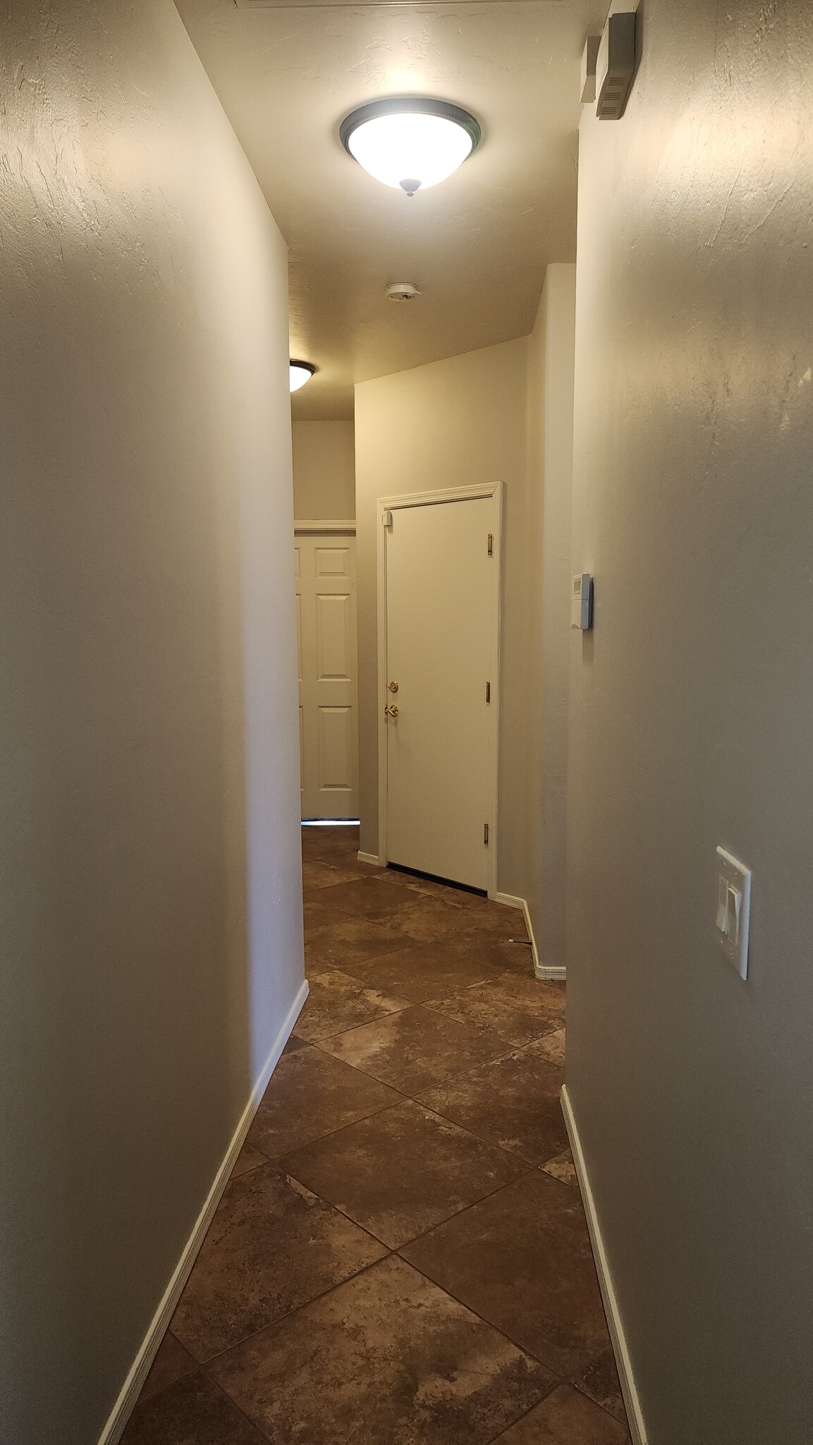 Hallway to bedrooms - 4815 E Silverpuffs Way