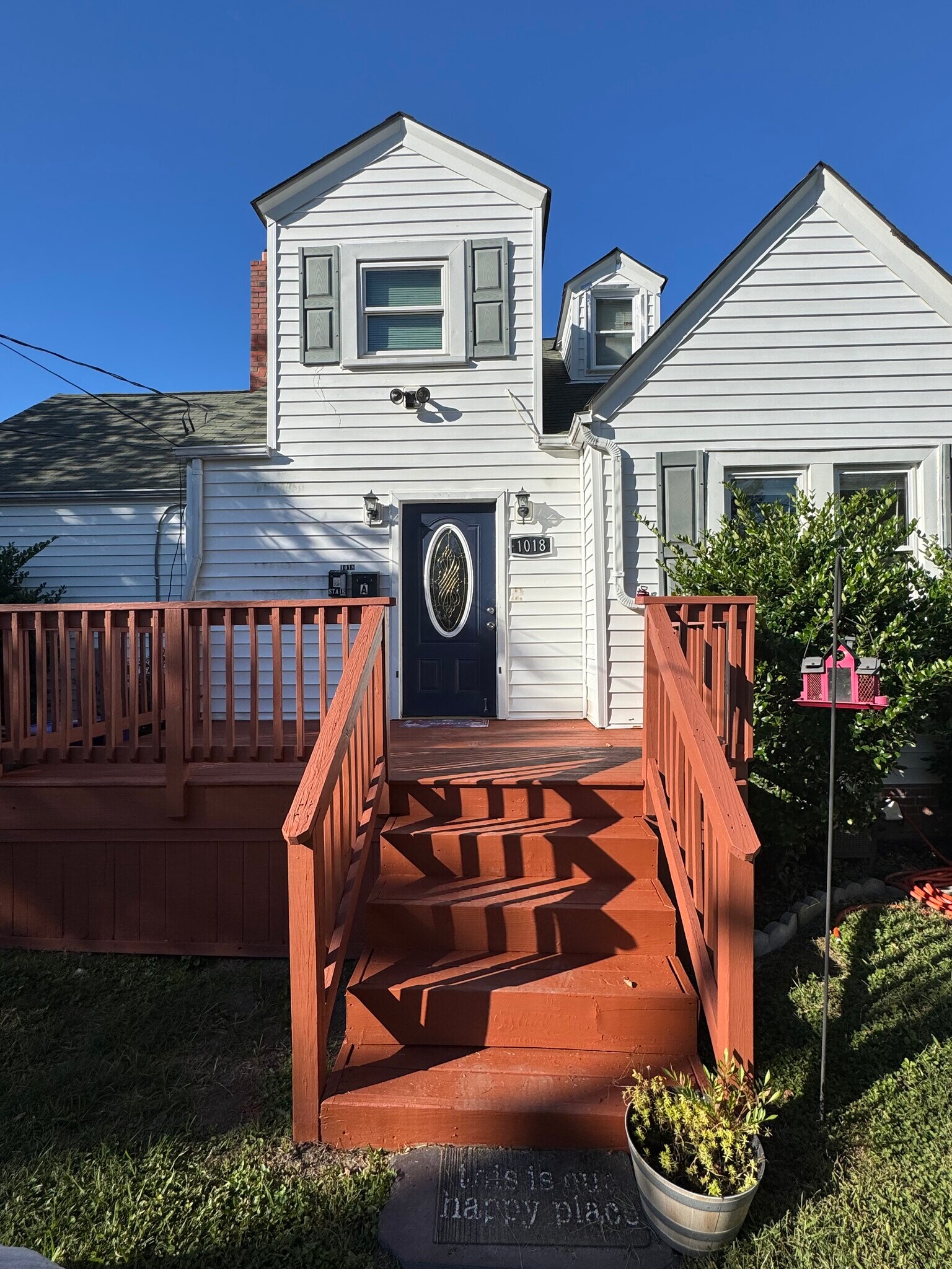 Entrance, nice sit down deck area - 1018 Wolcott Ave