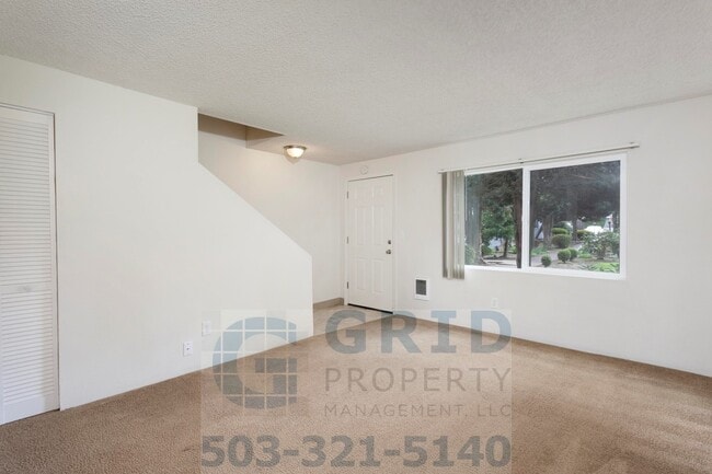 Building Photo - Two Story, Two Bedroom Apartment Available - Private Yard Space!