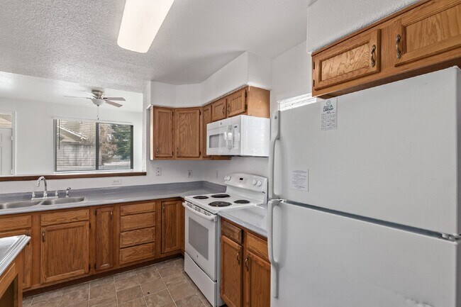 Building Photo - Spacious open plan three bed two bath townhome for rent