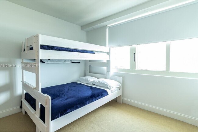 Building Photo - 9499 Collins Ave