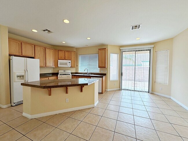 Building Photo - 4 BEDROOM HOME 3 CAR GARAGE ON A CORNER LO...