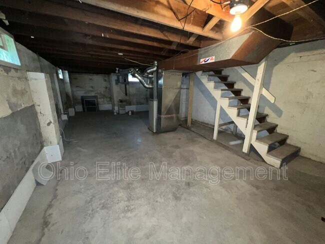 Building Photo - 1310 E 25th Ave