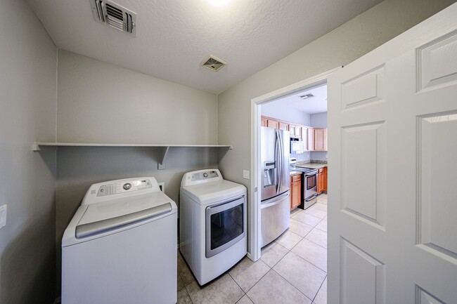 Building Photo - Welcome to this spacious 4 bedroom, 2.5 ba...