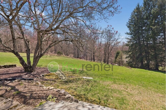 Building Photo - Charming 4-Bedroom Home on 2 Acres—Woods, Trails & Exceptional Storage