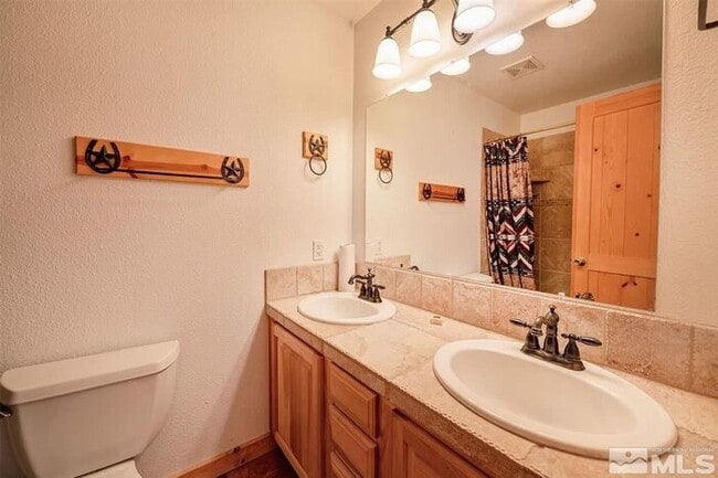 Building Photo - Spacious Lake-Adjacent Estate on 4.6 Acres in Silver Springs, NV