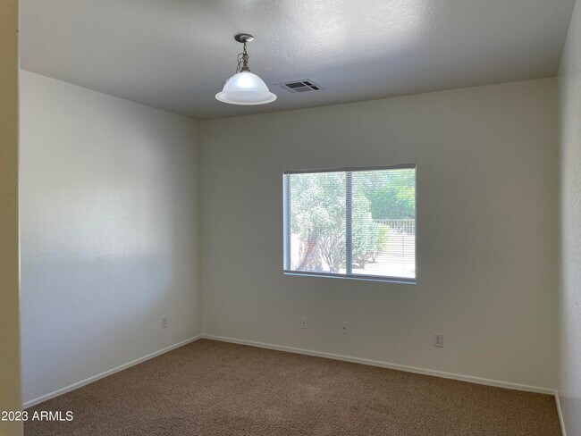 Building Photo - 23576 W Pecan Rd