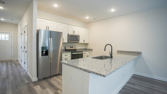 Building Photo - Brand-New Luxury 3BR Townhomes – First Mon...