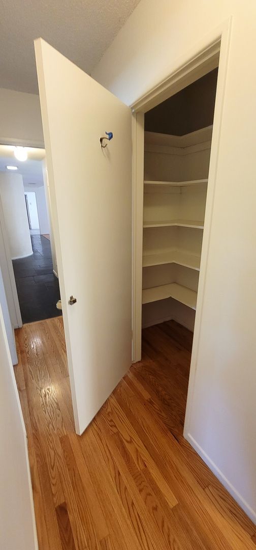 Building Photo - Classic, Midcentury 3 bedroom with Den, 2.5 bath home nestled into hillside with secluded backyar...