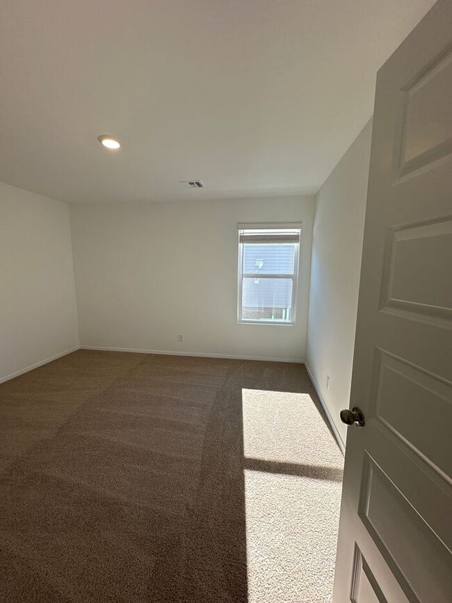 Building Photo - *Pre-leasing* BRAND NEW Three Bedroom | Tw...