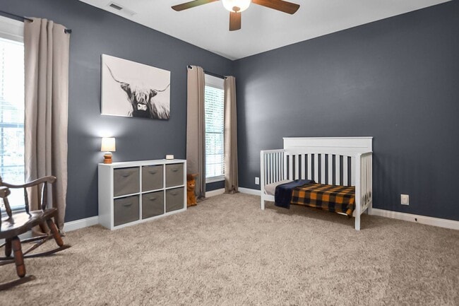 Building Photo - Pet Friendly Three Bedroom with Bonus!
