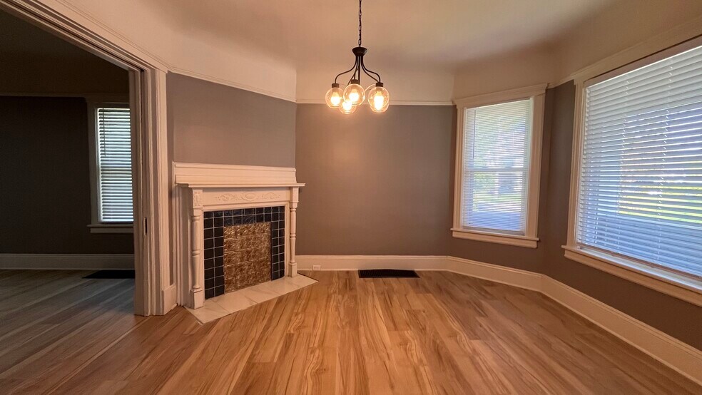 Dining room with decorative mantle - 2366 E 85th St