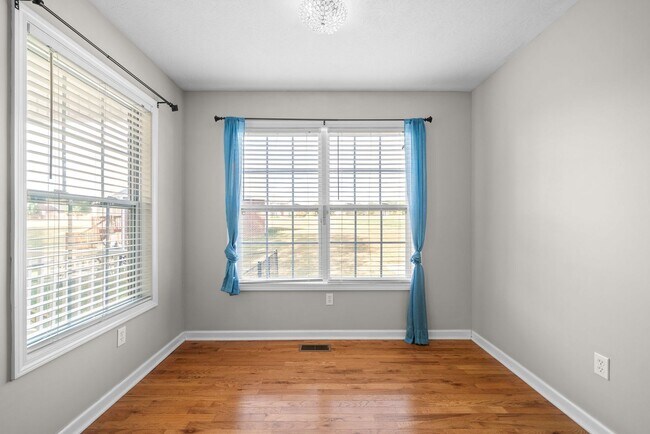 Building Photo - Pet Friendly Three Bedroom with Bonus!